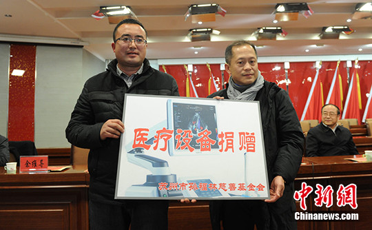 苏州孙福林基金会向甘肃积石山县捐赠“侨爱工程”.jpg